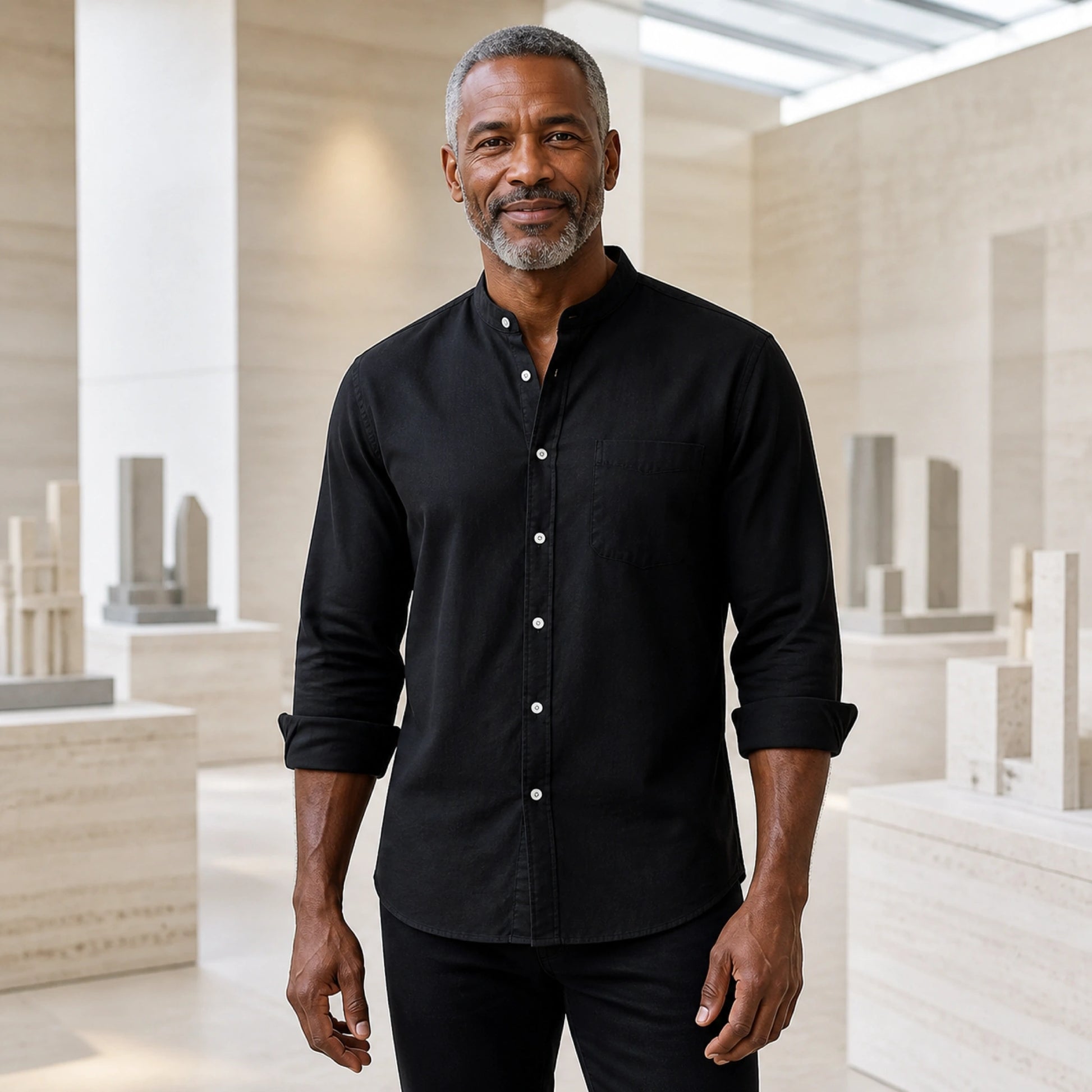 Mature man wearing the black slim fit cotton Oxford shirt, full front view with stand collar, chest pocket, rolled — view 6