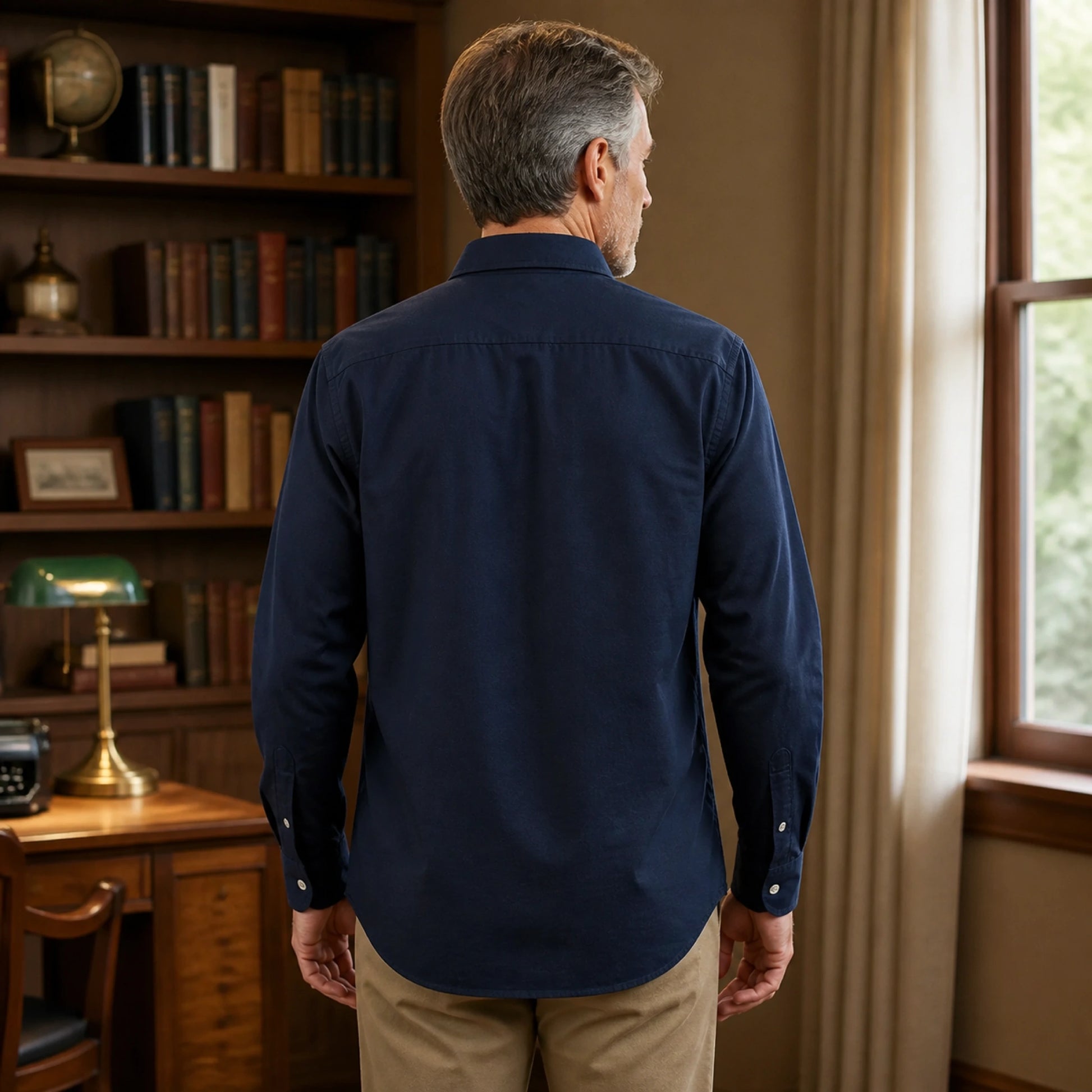 Mature man wearing Sapphire Blue casual thick Oxford shirt, realistic rear view showing collar, yoke, sleeves — view 6