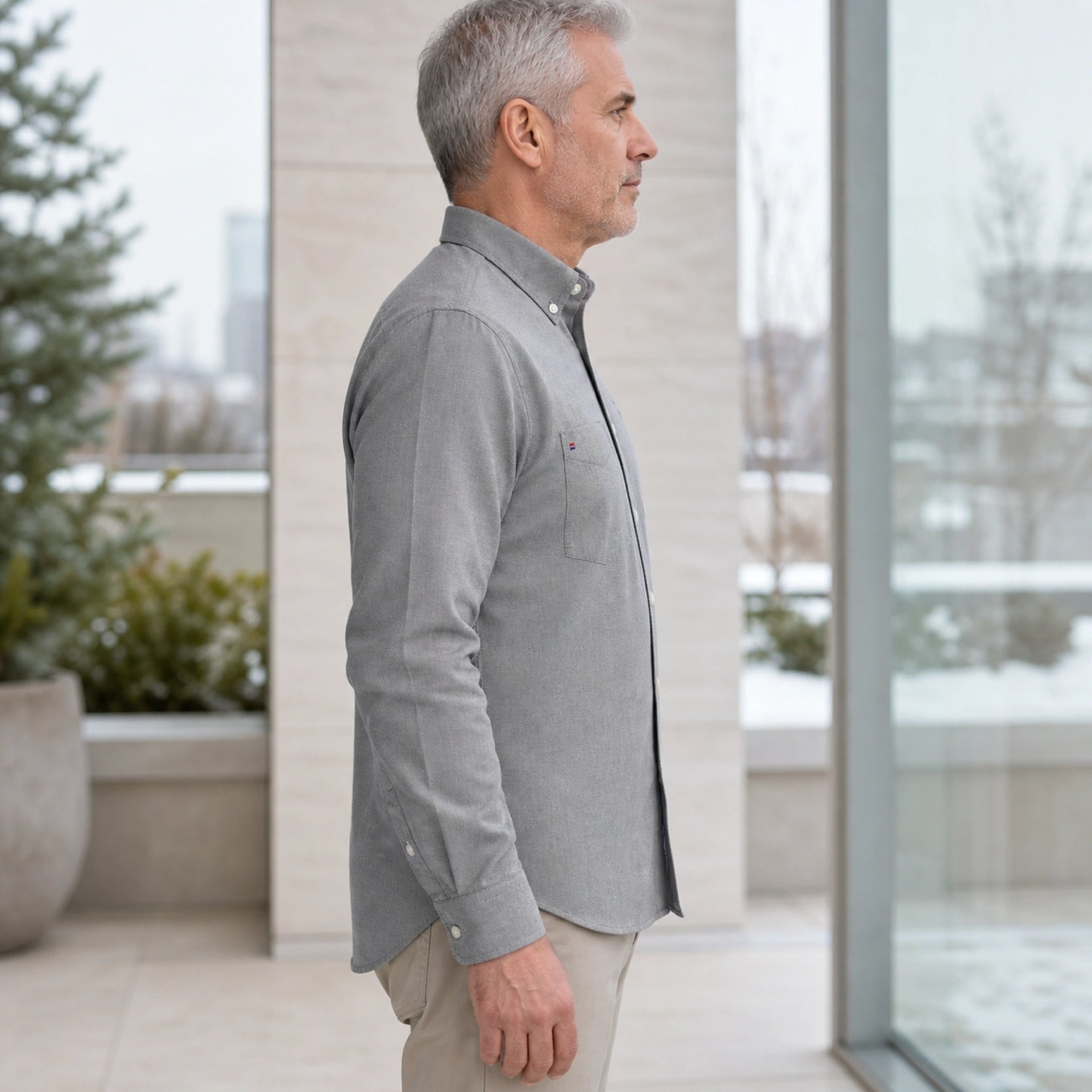 Professional mature man wearing the exact classic casual Oxford shirt — view 13