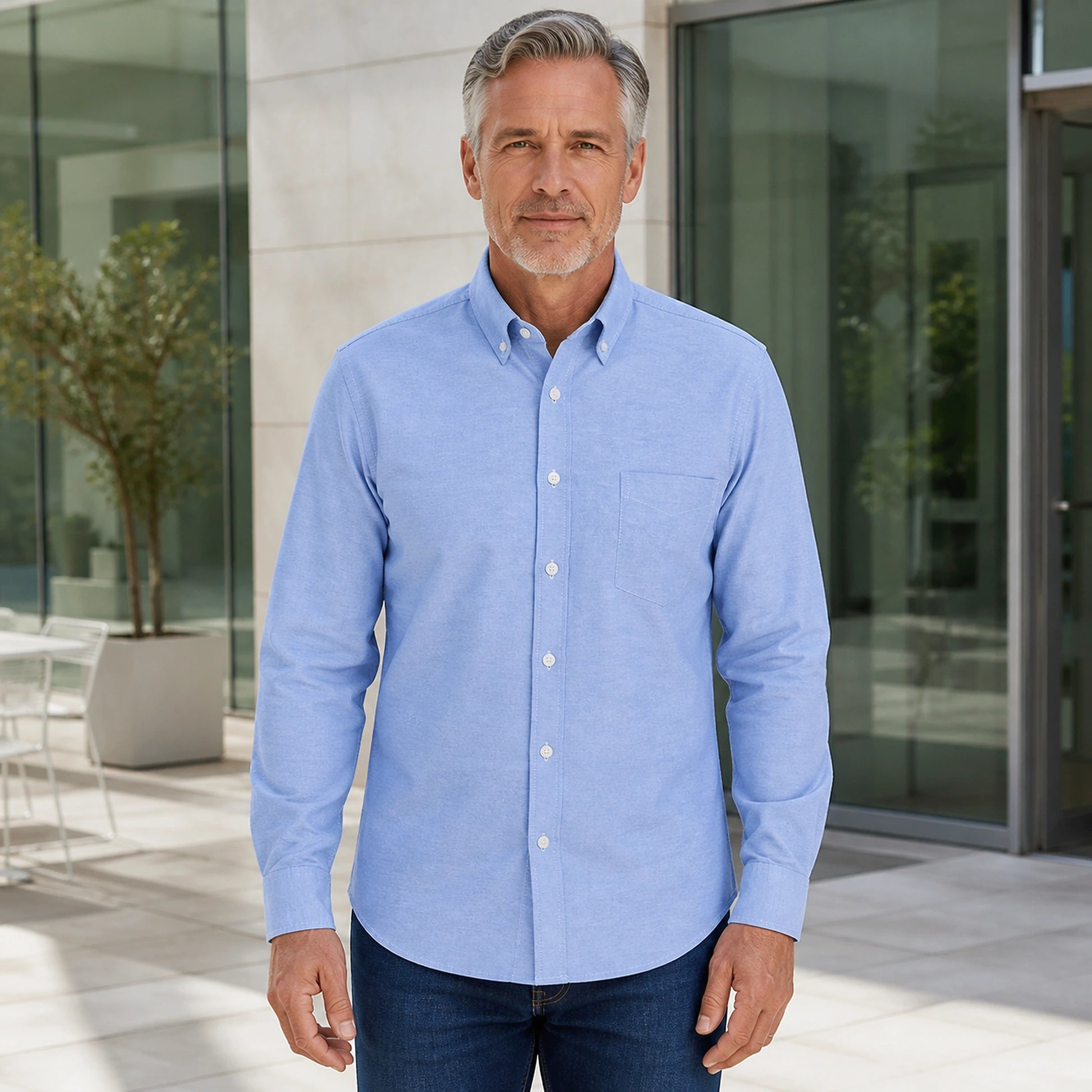 Professional mature man wearing the exact slim fit Oxford shirt