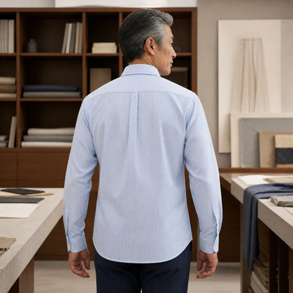 Mature man wearing Light Blue Stripe long sleeve Oxford shirt, realistic rear view showing striped fabric, collar — view 13