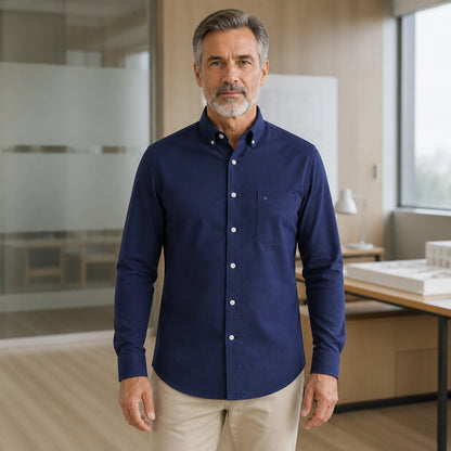 Mature man wearing Navy Blue long sleeve casual Oxford shirt, full front view with button down collar, chest pocket — view 6
