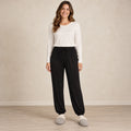 Women's Drawstring Cuffed Pajama Pants — Harper, Black, complete front view, worn by an adult model, professional image