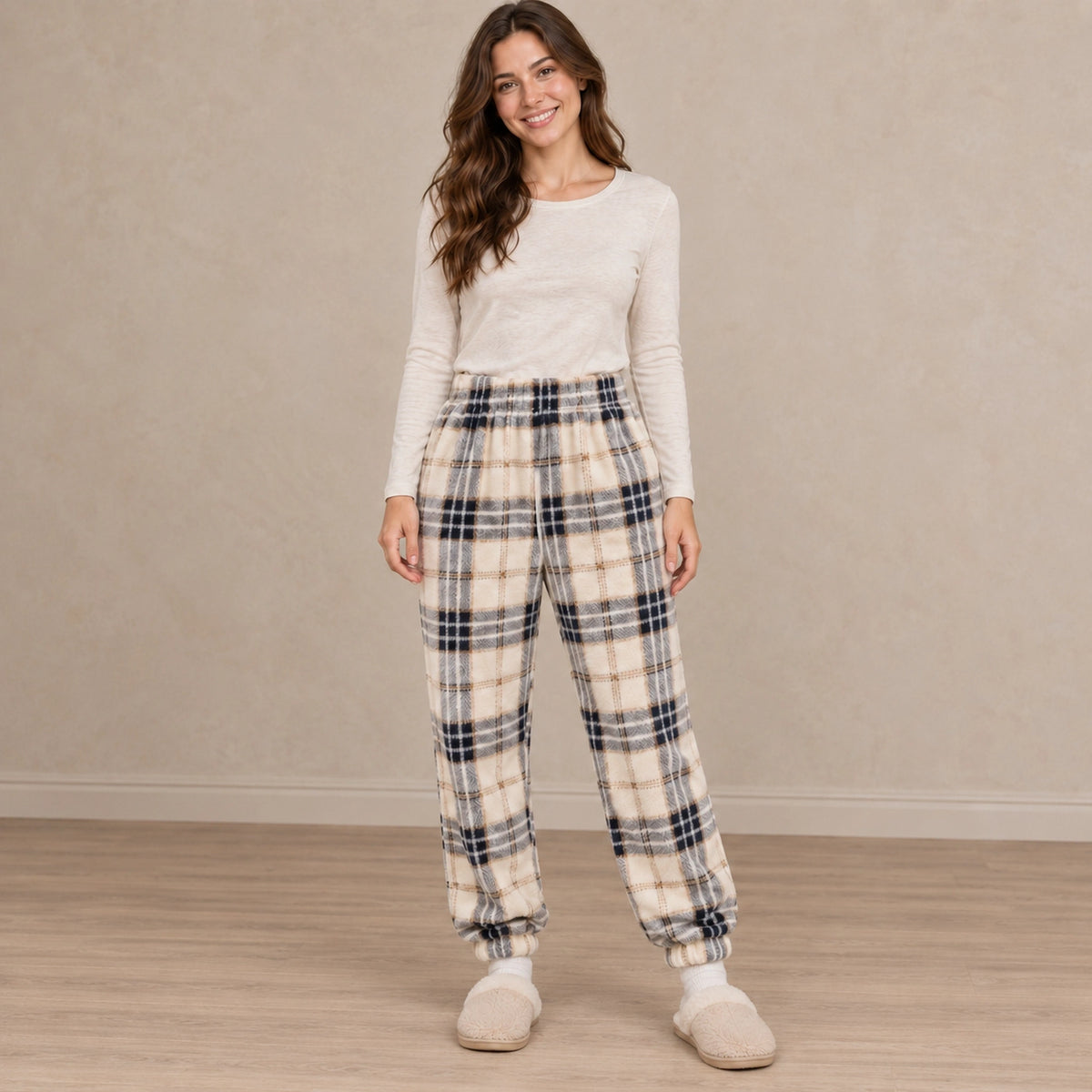 Women's Fleece Cuffed Pajama Pants — Nora, Cream Navy Tartan, complete front view, worn by an adult model, professional image
