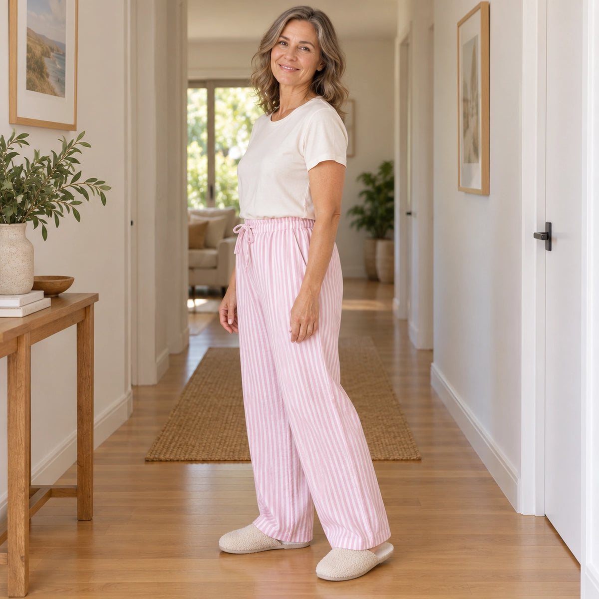 Pink Stripe cotton gauze pajama pants, complete side fit view at home — view 5