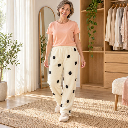 Cream Black Spot Print plush pajama pants, full front view on a mature model in home dressing area — view 8