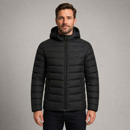 Man wearing black USB heated hooded parka coat, complete front view