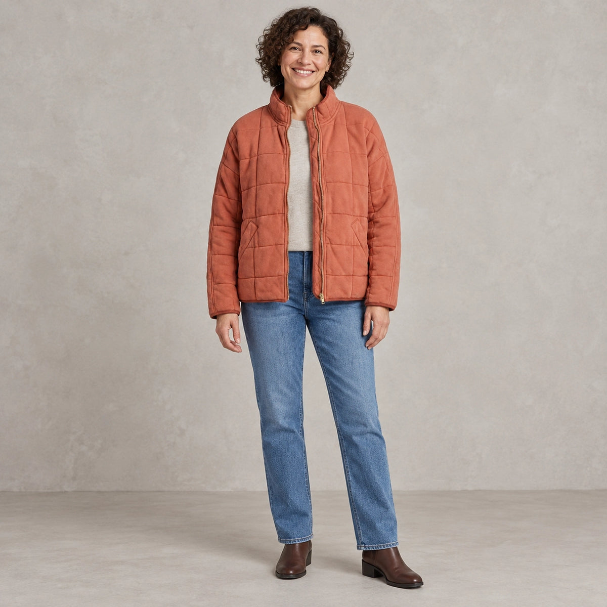 puffer jacket — Full front view; Terracotta; complete product worn by a happy adult model — view 8
