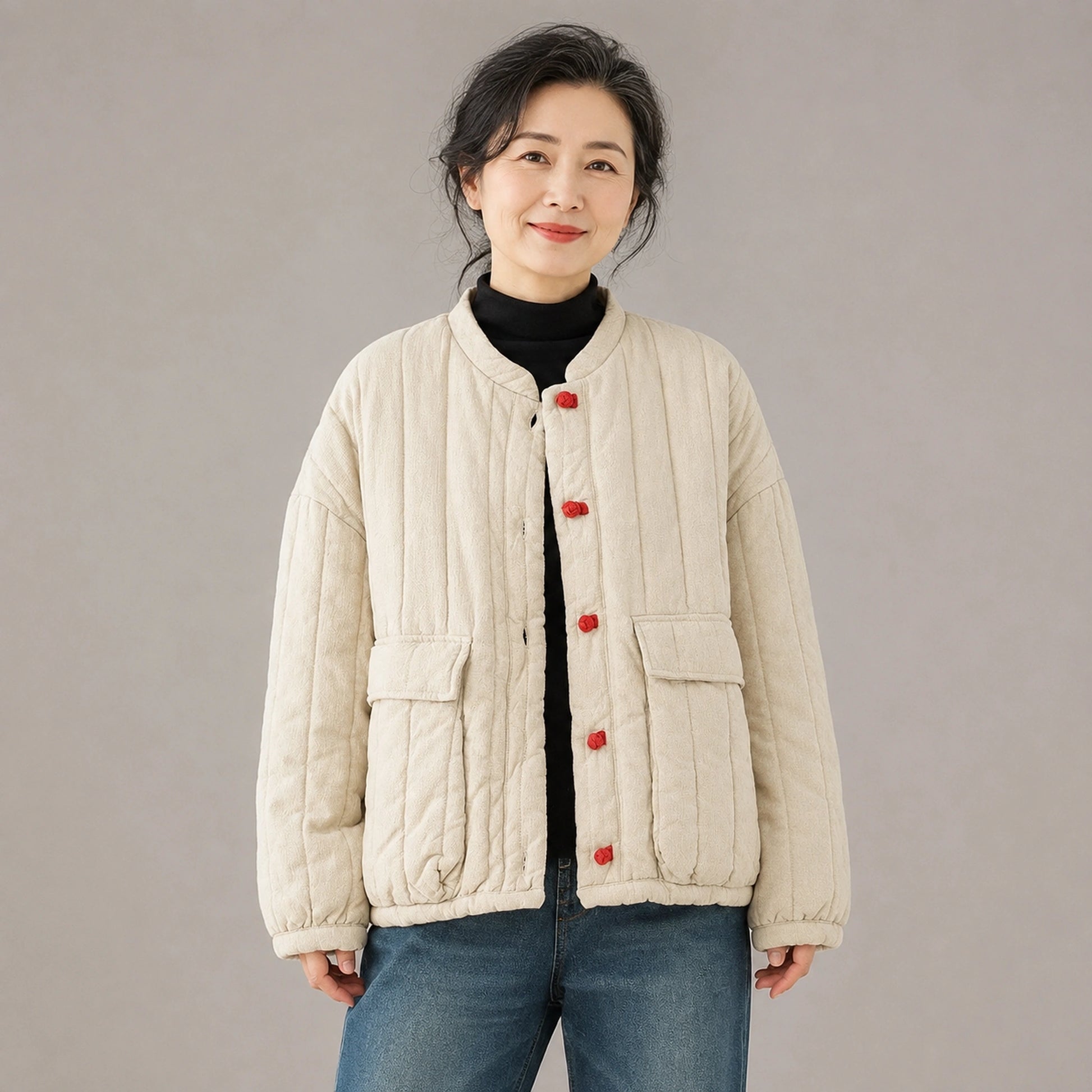 Beige cotton linen short quilted jacket front view on a model