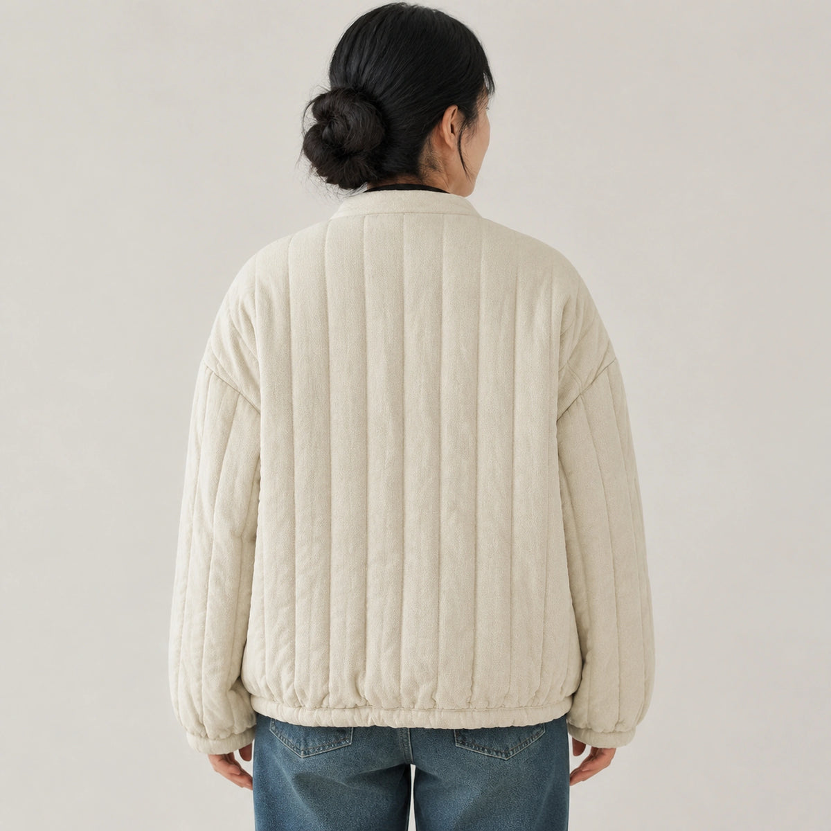 Beige cotton linen short quilted jacket direct back view on a model — view 2