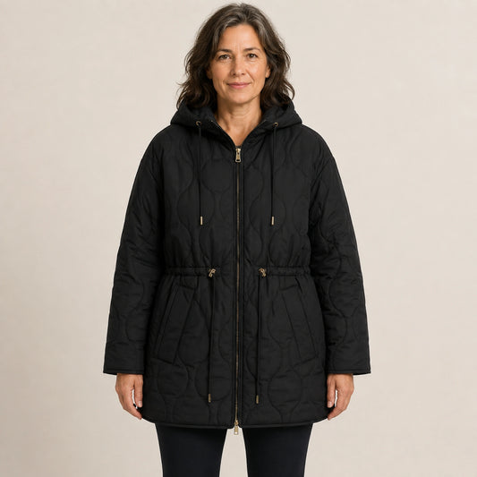 Black hooded longline quilted jacket front view on a model