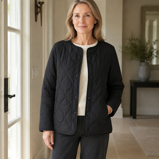 Claire black collarless quilted jacket complete front view