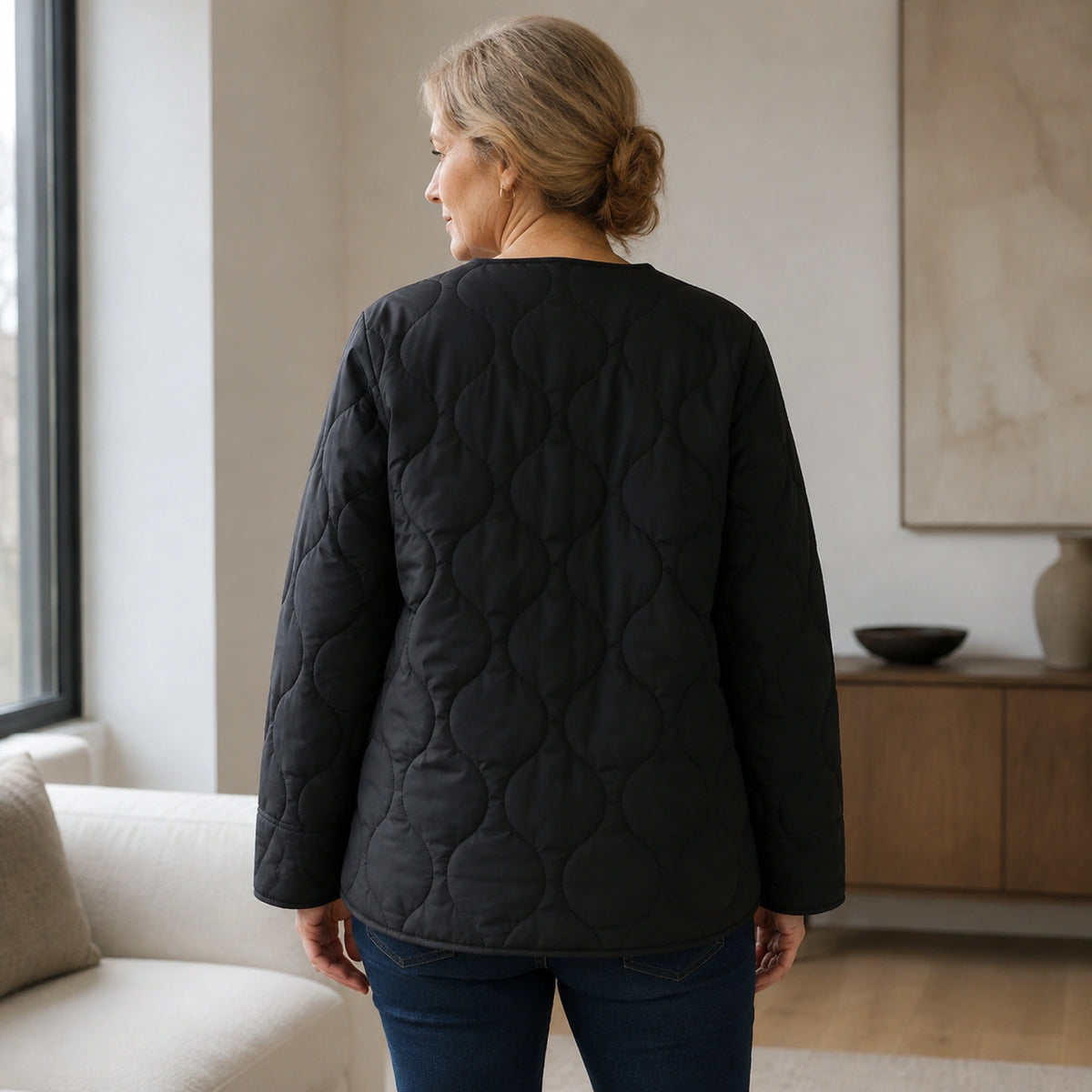 Claire black quilted jacket direct back view worn by model — view 3