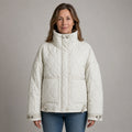 quilted jacket — White drawstring high neck quilted coat front view on a model