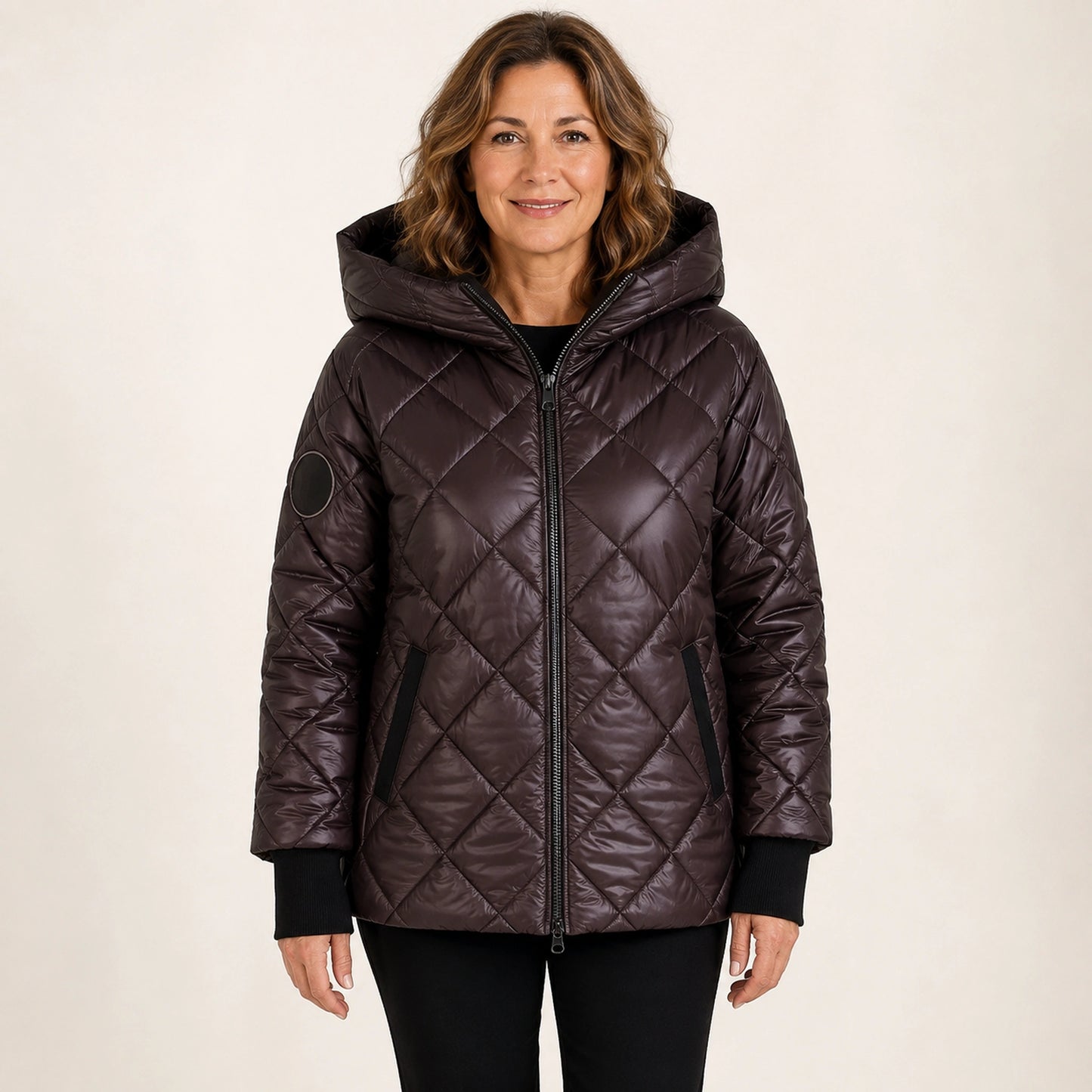 Coffee hooded casual quilted jacket front view on a model