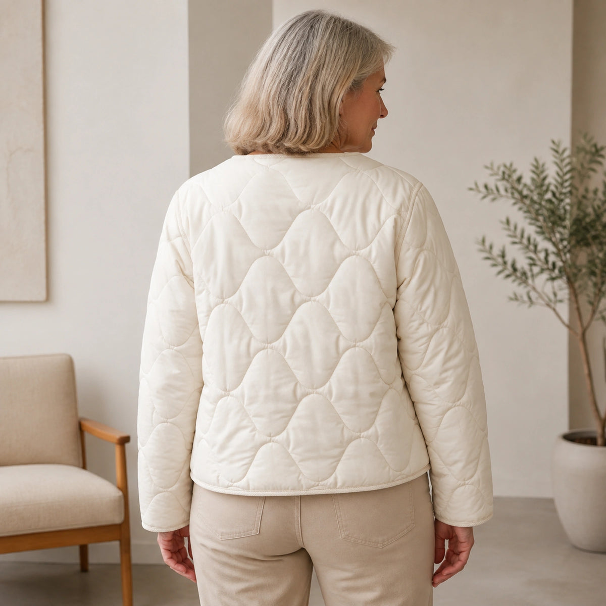 Violet beige quilted jacket direct back view worn by model — view 4