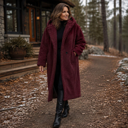 red coat — Woman wearing the Olivia red teddy coat outside a winter cabin — view 5