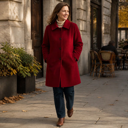 Mature woman wearing the Stella red coat on an autumn city street — view 5