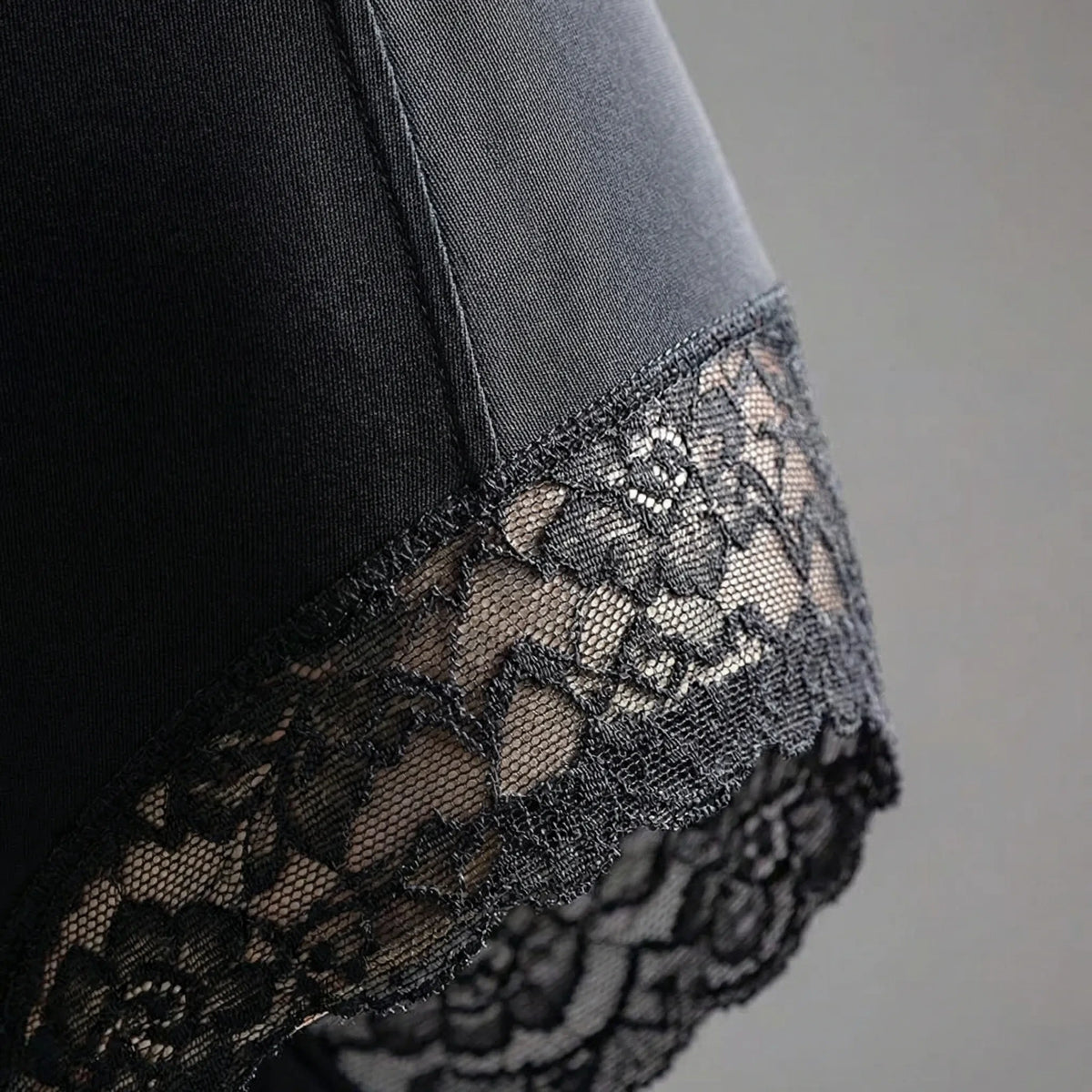 Black bodysuit with lace trim detail, close up view of fabric and design — 3 — view 3
