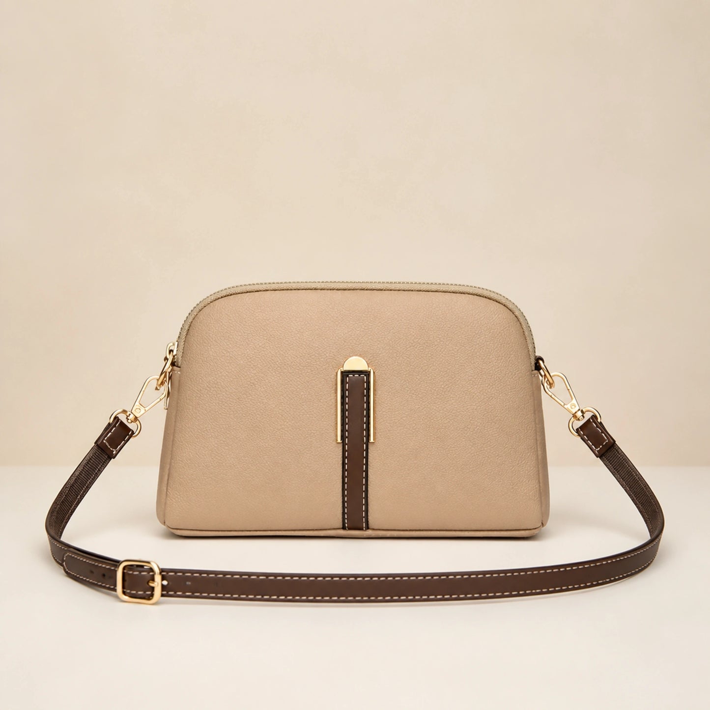 Taupe sling bag complete front view — view 4