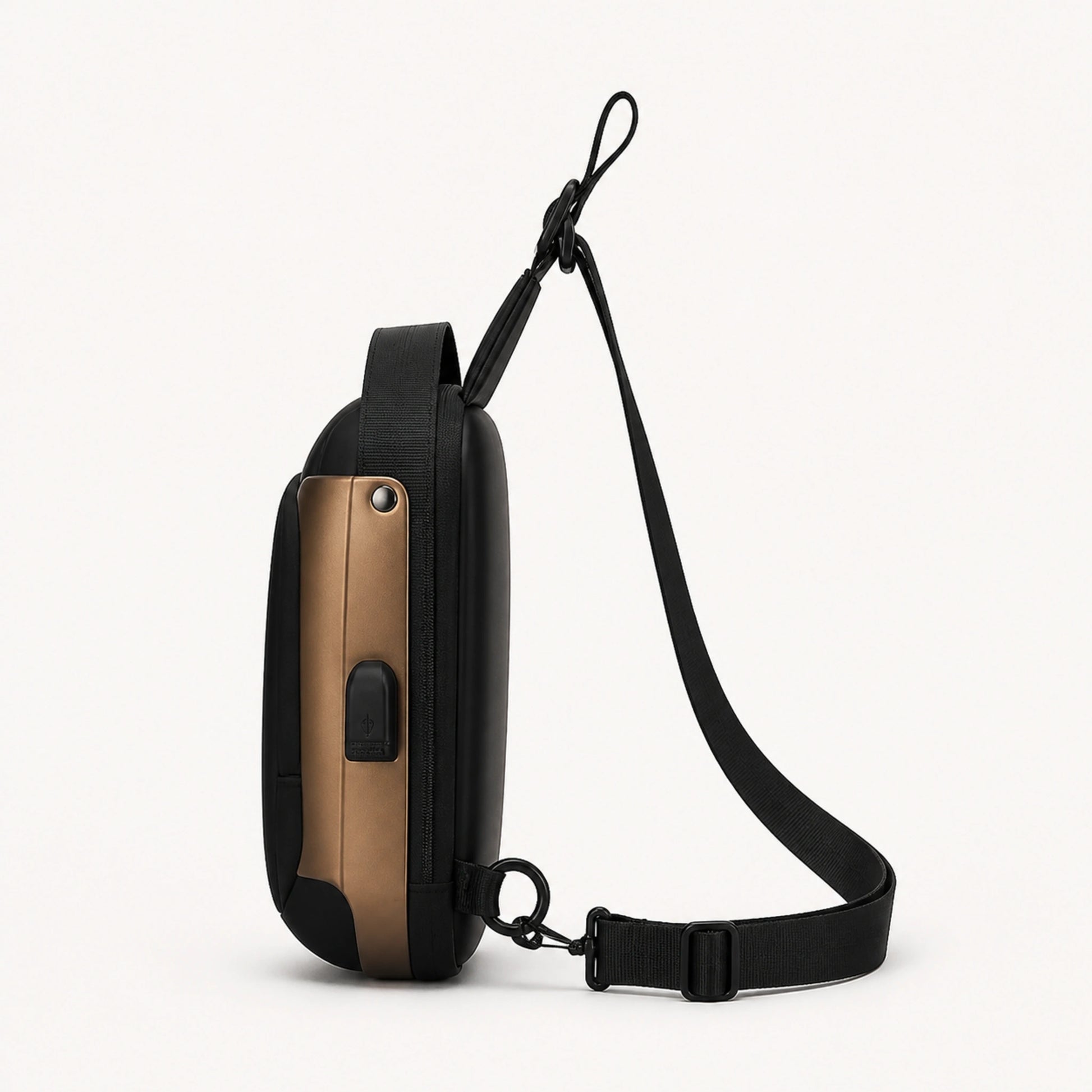 Black hard shell chest sling bag with Gold Trim true side profile — view 6