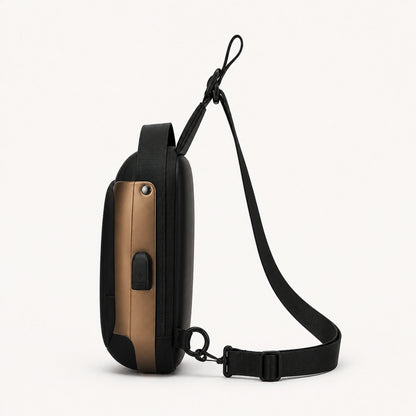 Black hard shell chest sling bag with Gold Trim true side profile — view 6