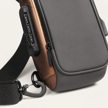 Gray hard shell chest sling bag with Gold Trim zipper and hardware detail — view 7