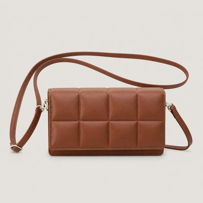 Warm brown quilted sling bag complete front view