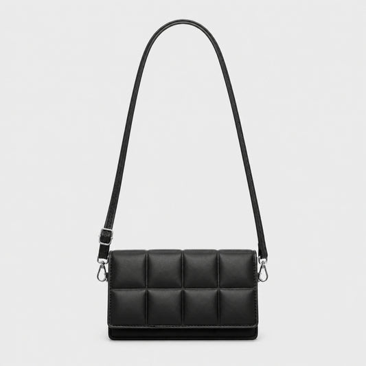 Black quilted sling bag complete front view — view 2
