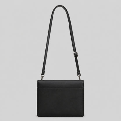 Black quilted sling bag back view — view 4