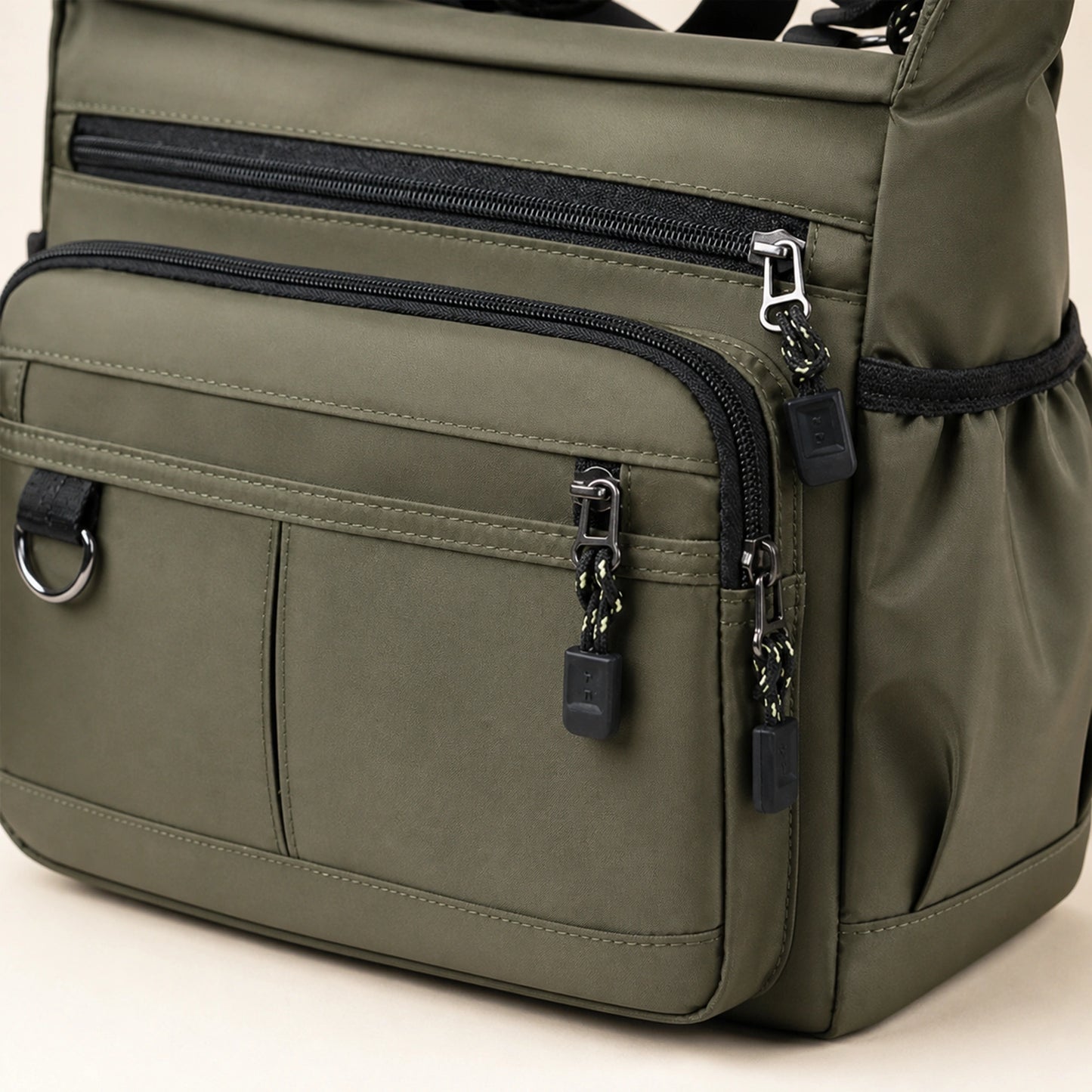 Olive Green multipocket crossbody sling bag construction detail — view 7