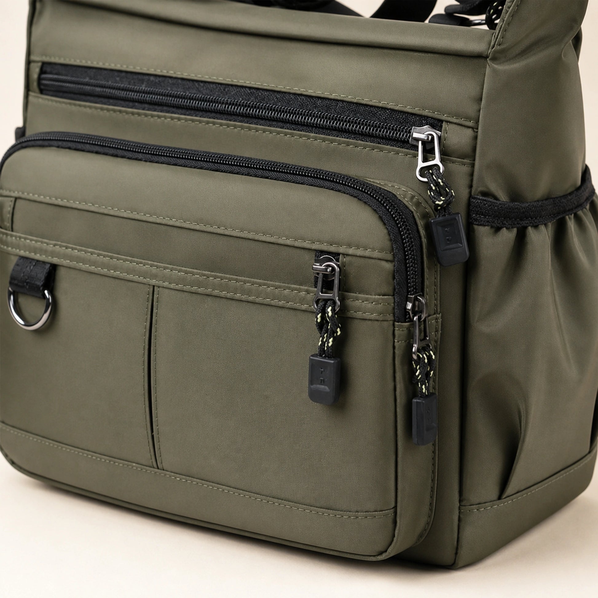 Olive Green multipocket crossbody sling bag construction detail — view 7