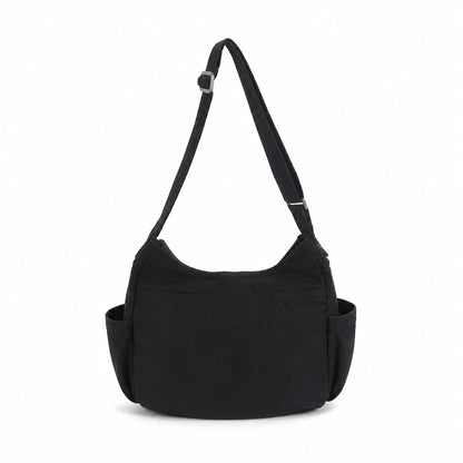 Black vintage multi pocket canvas sling bag true rear view — view 4