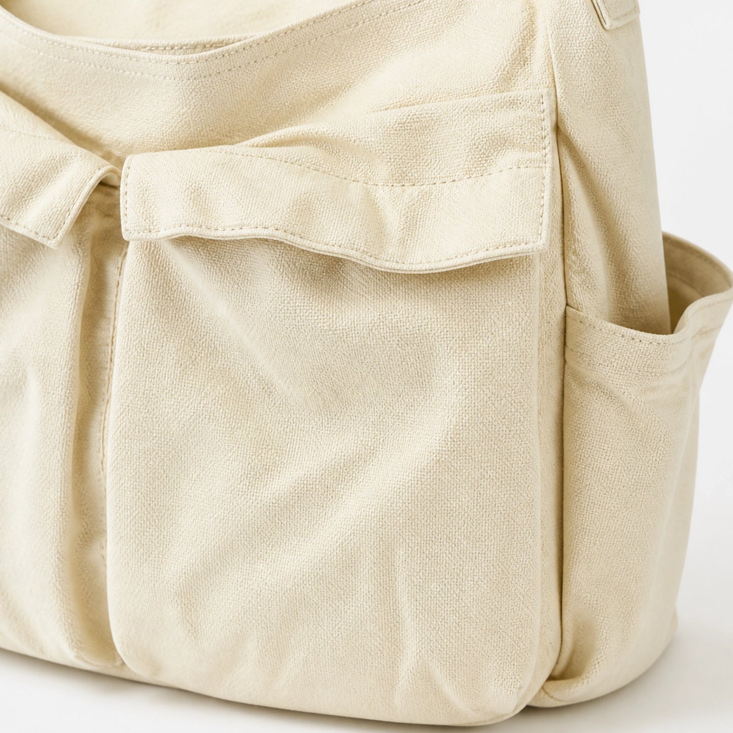 Beige vintage multi pocket canvas sling bag stitching and detail — view 6