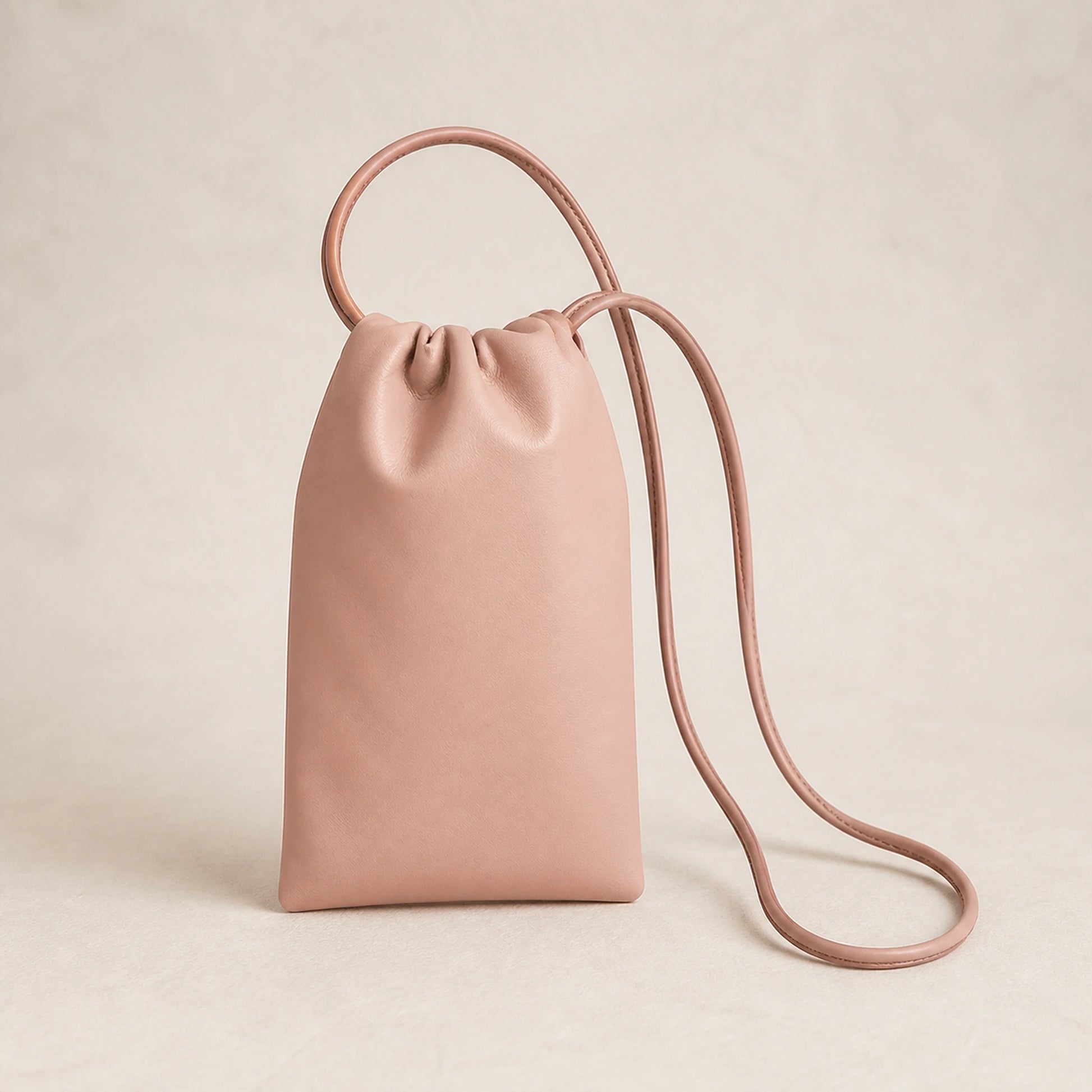 sling bag — Pink drawstring sling phone pouch complete front view — view 3