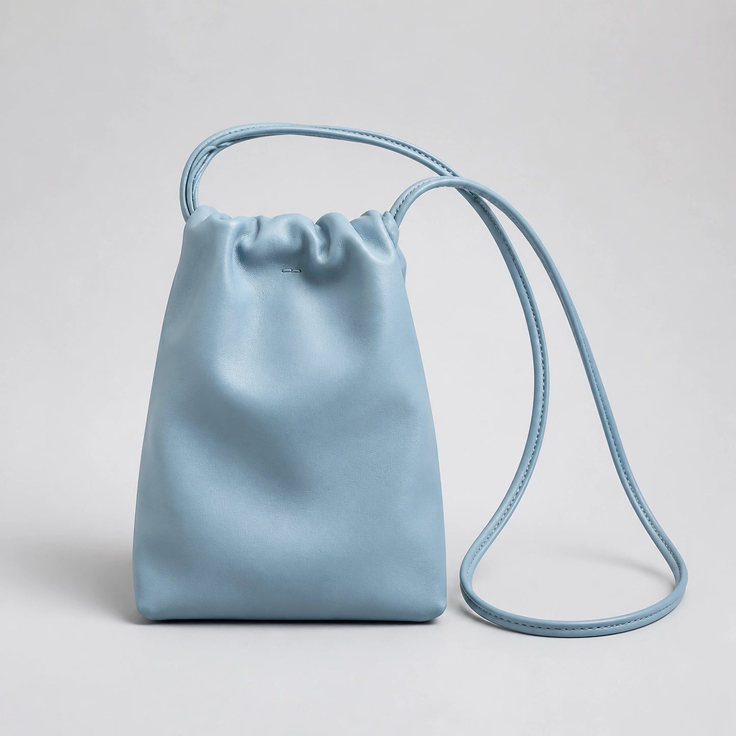 sling bag — Sky Blue drawstring sling phone pouch complete front view — view 4