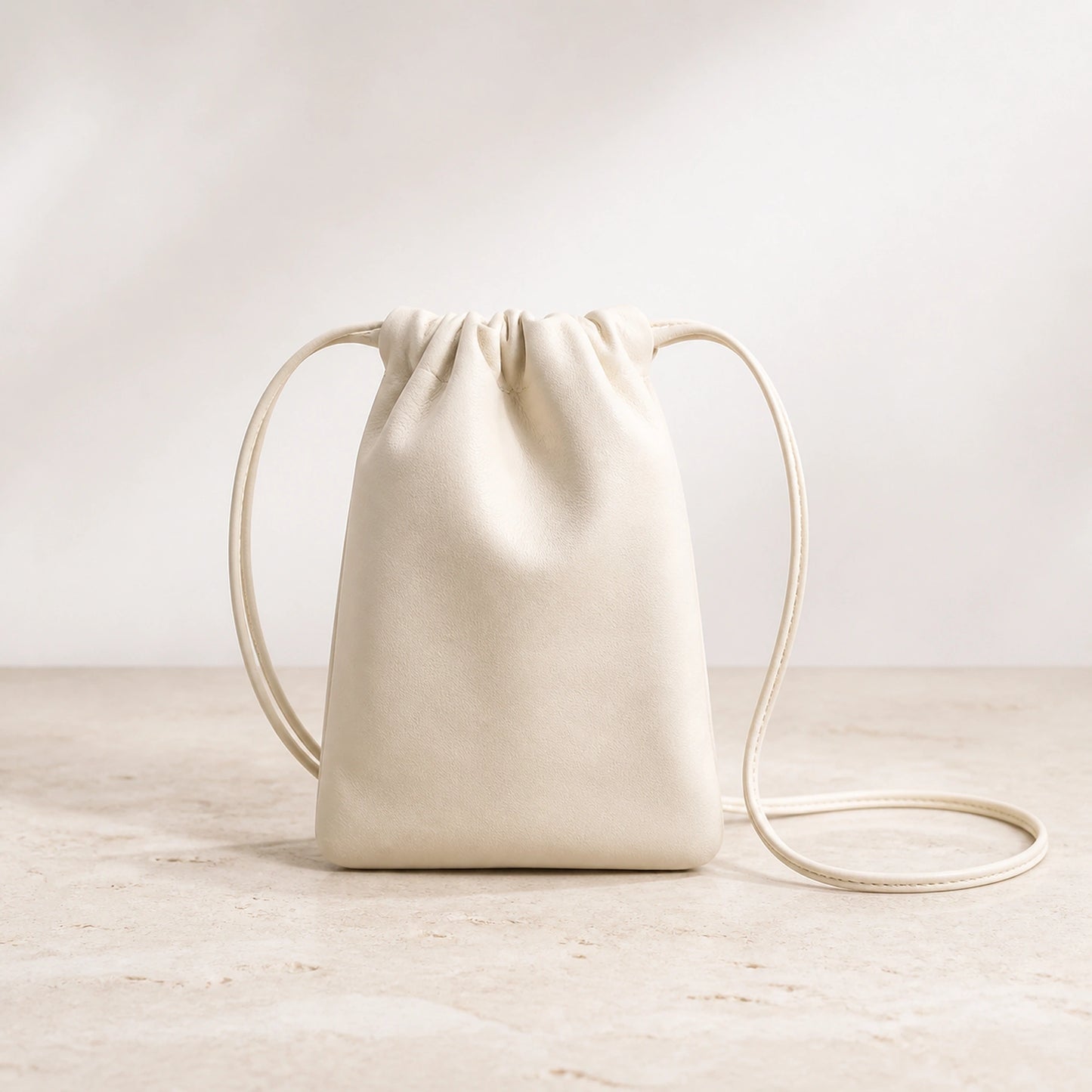 sling bag — Beige drawstring sling phone pouch complete front view — view 7