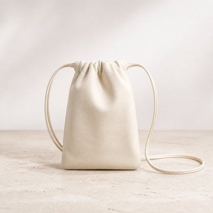 sling bag — Beige drawstring sling phone pouch complete front view — view 7