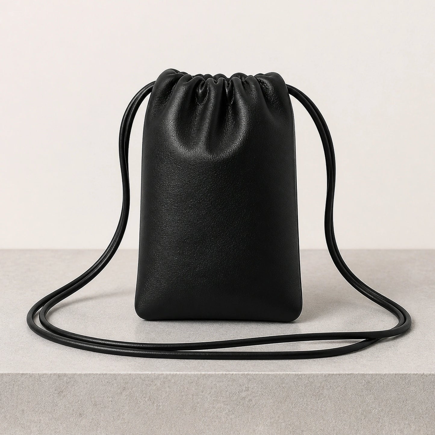 sling bag — Black drawstring sling phone pouch rear view — view 8