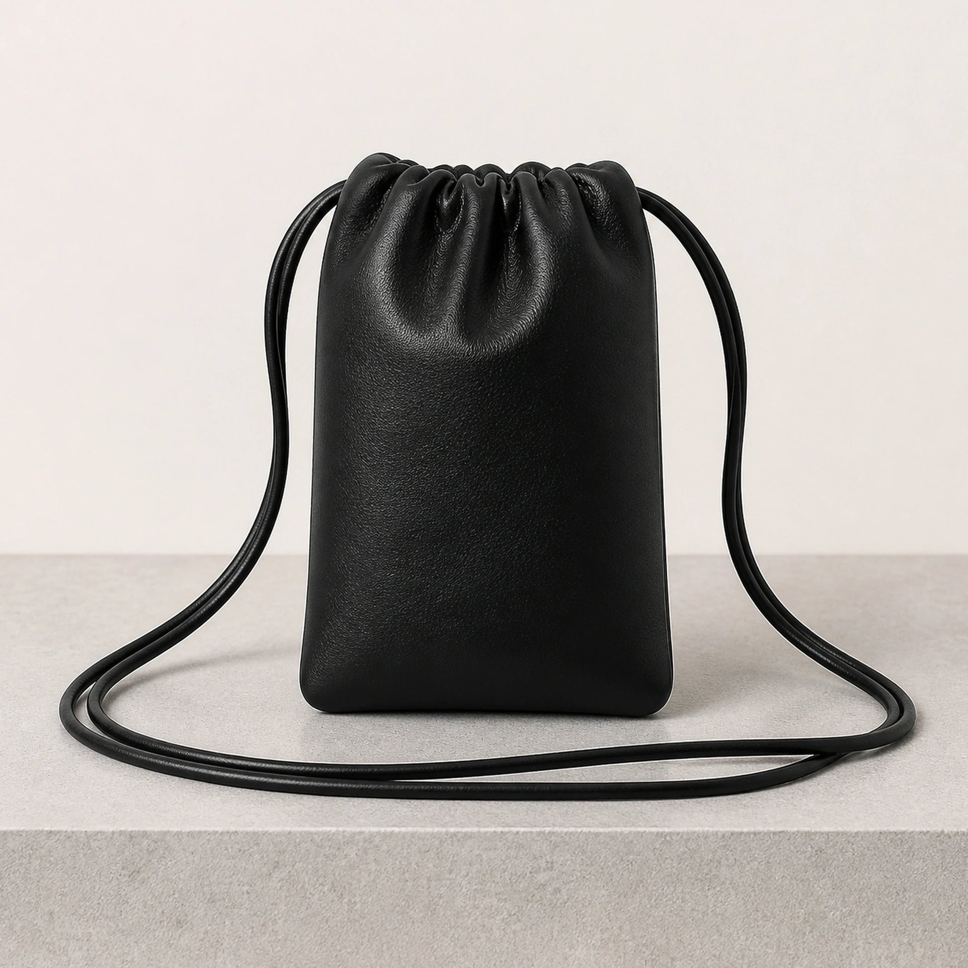 sling bag — Black drawstring sling phone pouch rear view — view 8