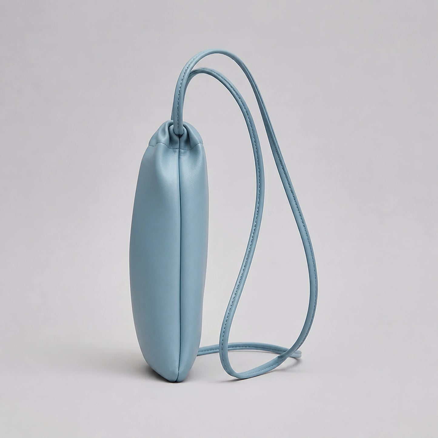 sling bag — Sky Blue drawstring sling phone pouch side profile — view 9