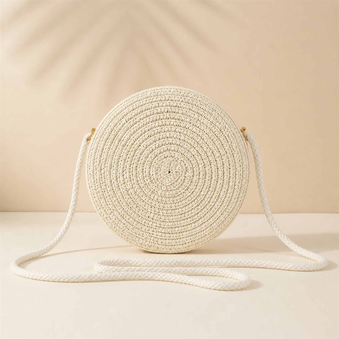 Ivory Round sling bag complete front view — view 4
