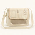 sling bag — Beige large nylon messenger display bag complete front view