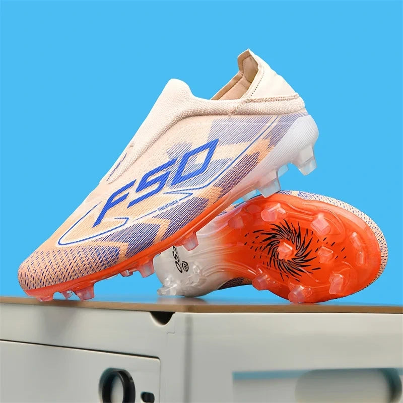 High top soccer cleats in light beige with blue and orange accents, displayed on a surface — view 13 — view 8