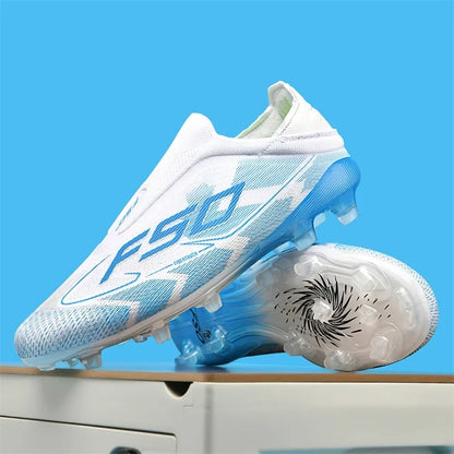 White and blue high top soccer cleats with textured sole slip on design, angled view — 14 — view 9