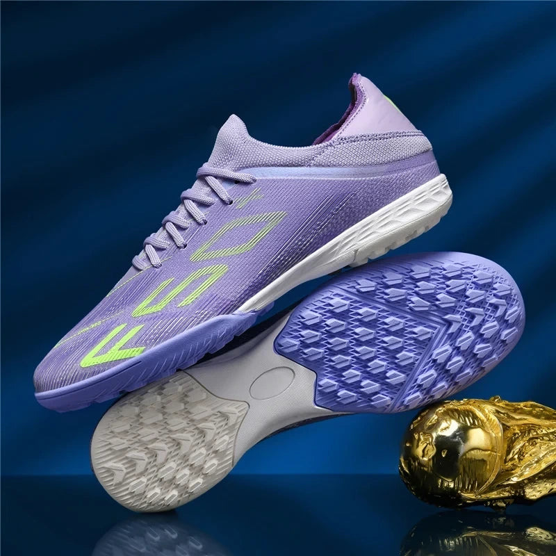Purple high top soccer cleats with non slip soles displayed against a blue background — view 12 — view 13