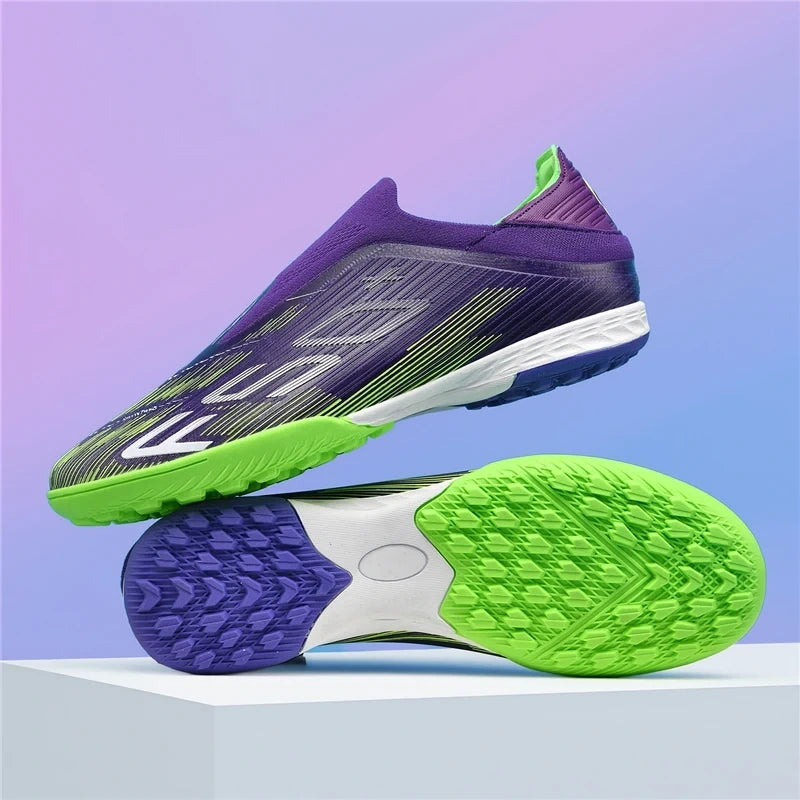 High top soccer cleats in purple and green with non slip soles, displayed on a pedestal — view 14 — view 15