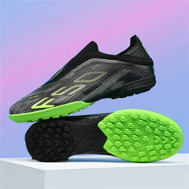 Black and green non slip high top soccer cleats with textured sole, displayed on a platform — view 15 — view 16