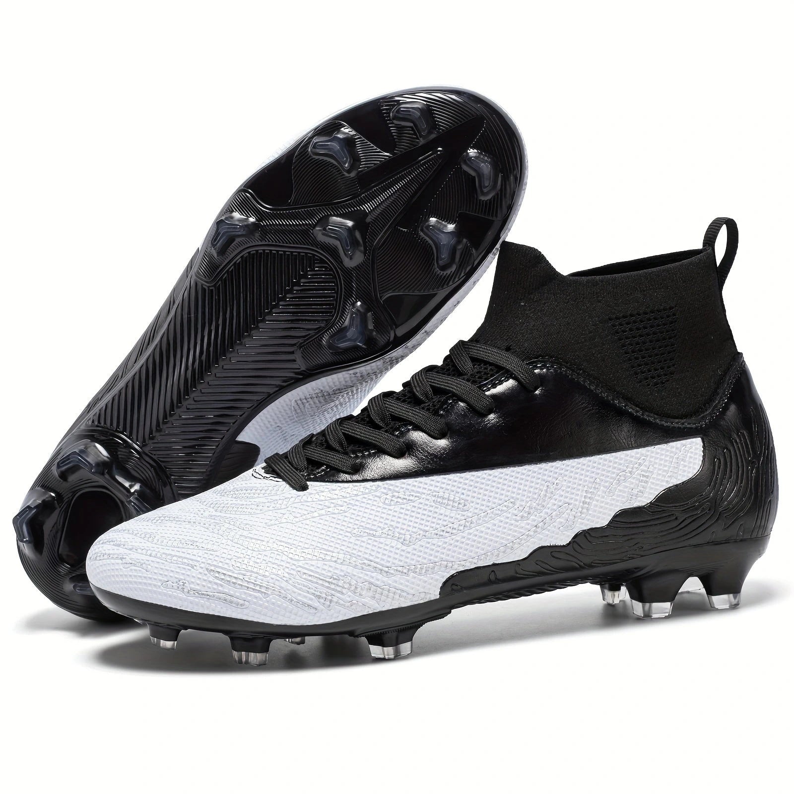 Black and white lightweight soccer cleats with textured design studded sole — view 15 — view 15