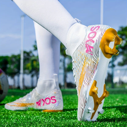 White soccer cleats with gold and pink accents on green grass field — view 16 — view 16
